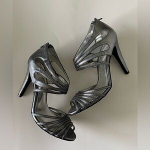 Sleek Silver Stiletto Heels with Intricate Straps
